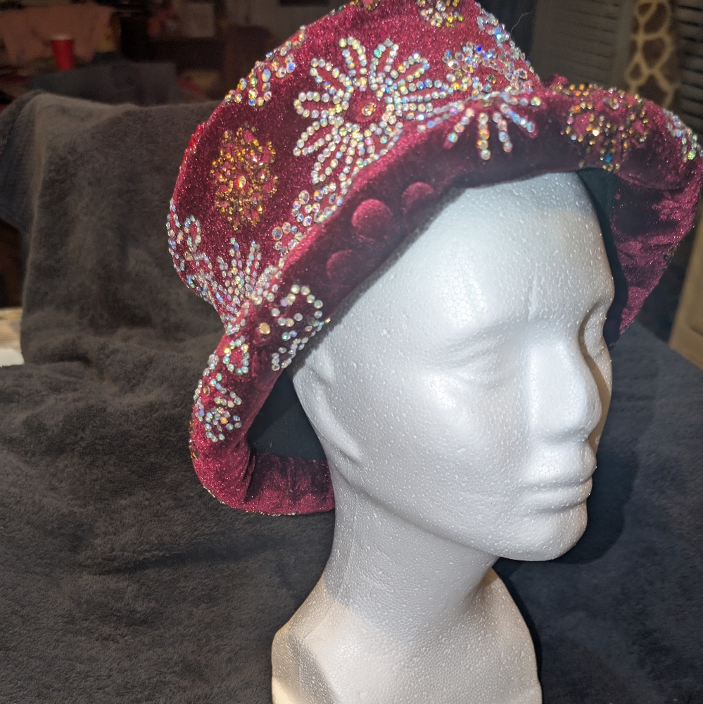 A burgundy velvet hat embellished with glass and Swavorsky crystal gems. - Picture 3 of 11